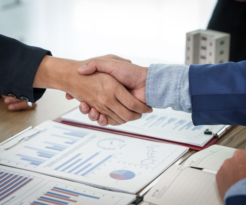 Two,Individuals,Shake,Hands,In,Agreement,After,A,Successful,Business