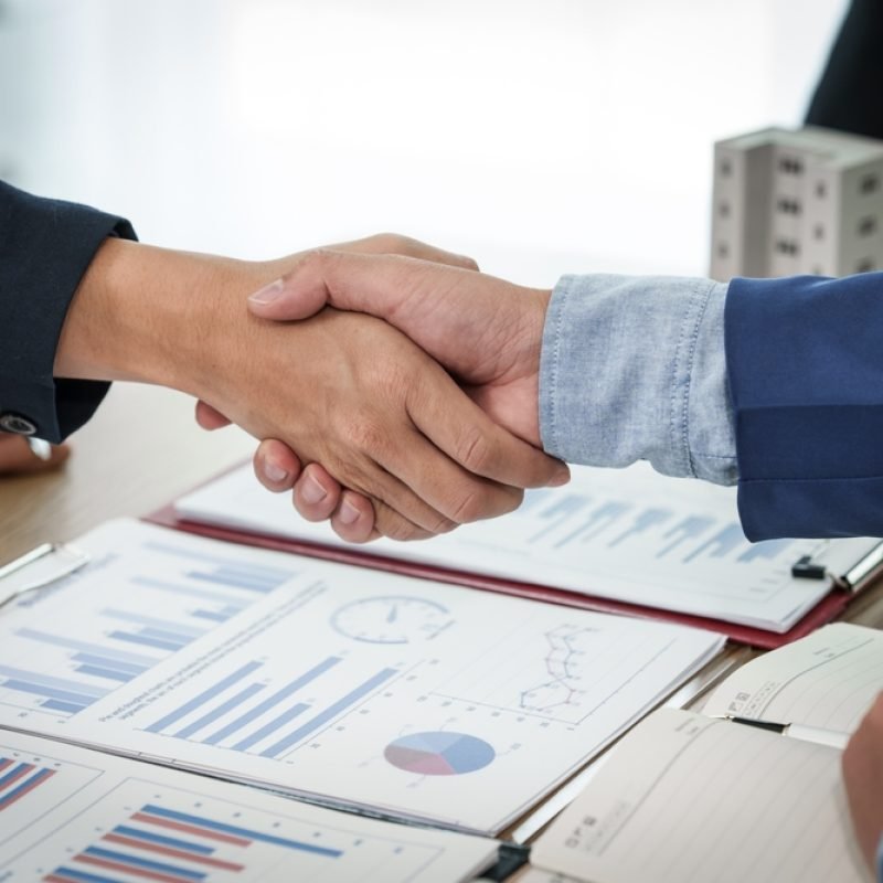 Two,Individuals,Shake,Hands,In,Agreement,After,A,Successful,Business