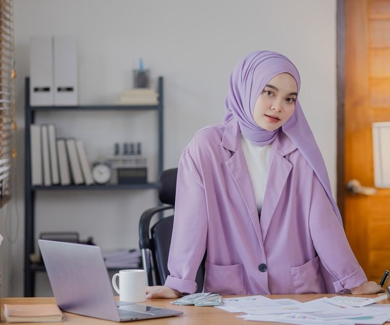 Young,Asian,Islamic,Women,Stressed,From,Work,At,Office,Desk.