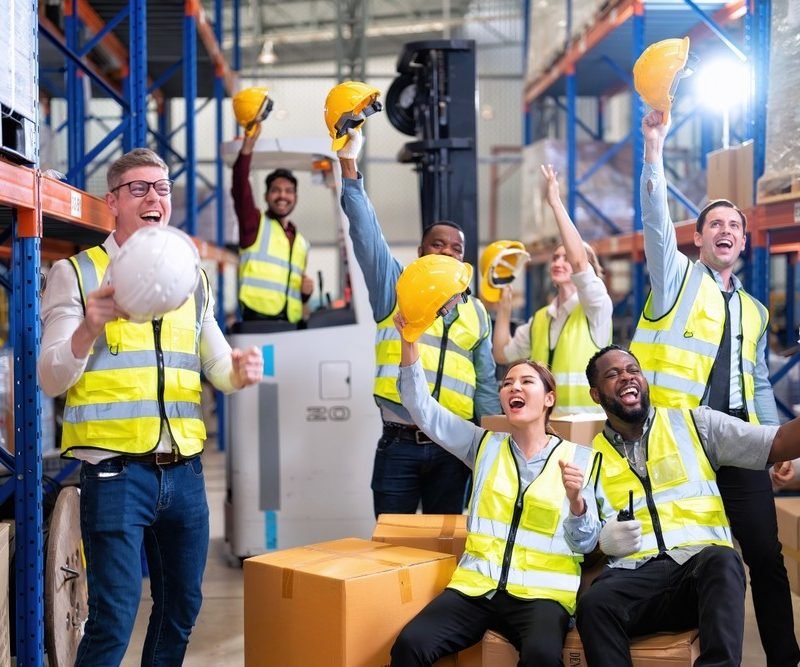 Warehouse,Workers,Raise,Hands,Up,Show,Their,Happy,From,The